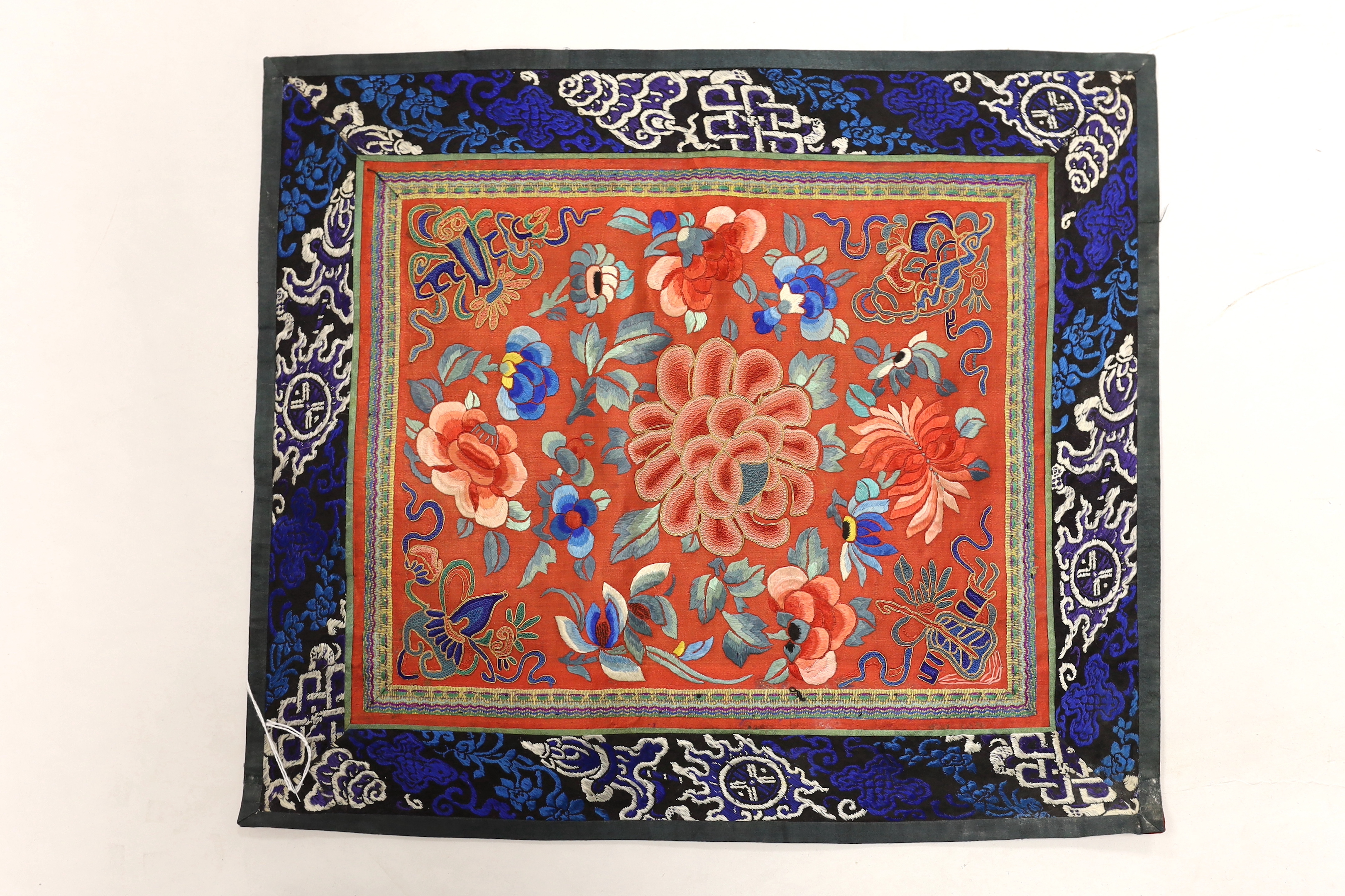 Six panels of Chinese silk embroidery, all using mixed stitches including Beijing knot, all bordered with silk brocade, largest 44cm x 38cm